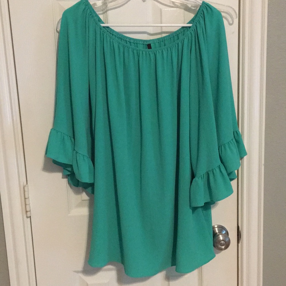 Tunic top with bell style sleeves